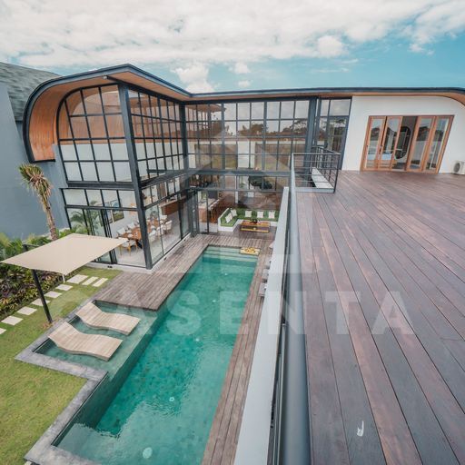Rooftop terrace with rice field views at cemagi villa
