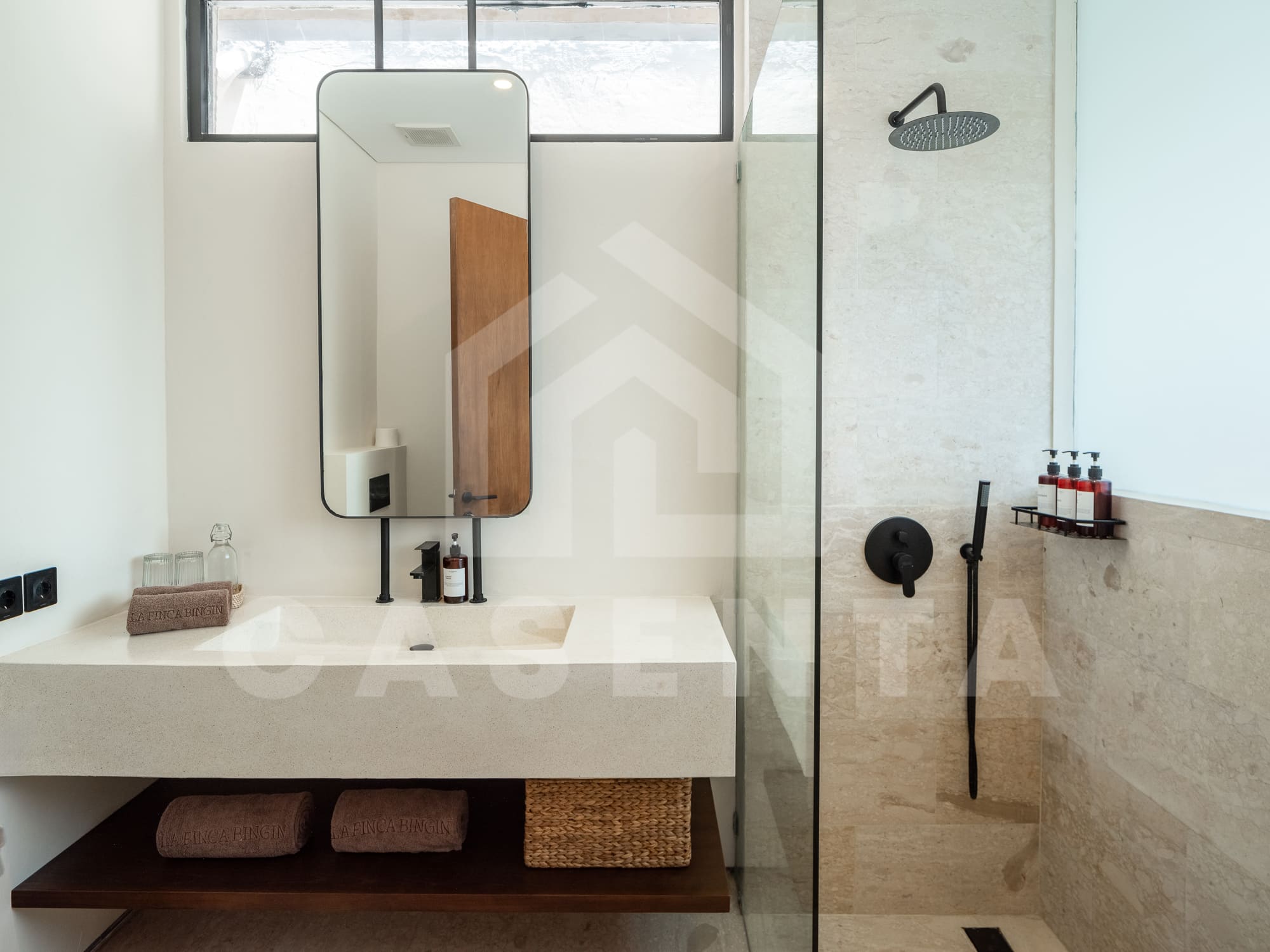 Modern bathroom with rain shower in batu bolong villa