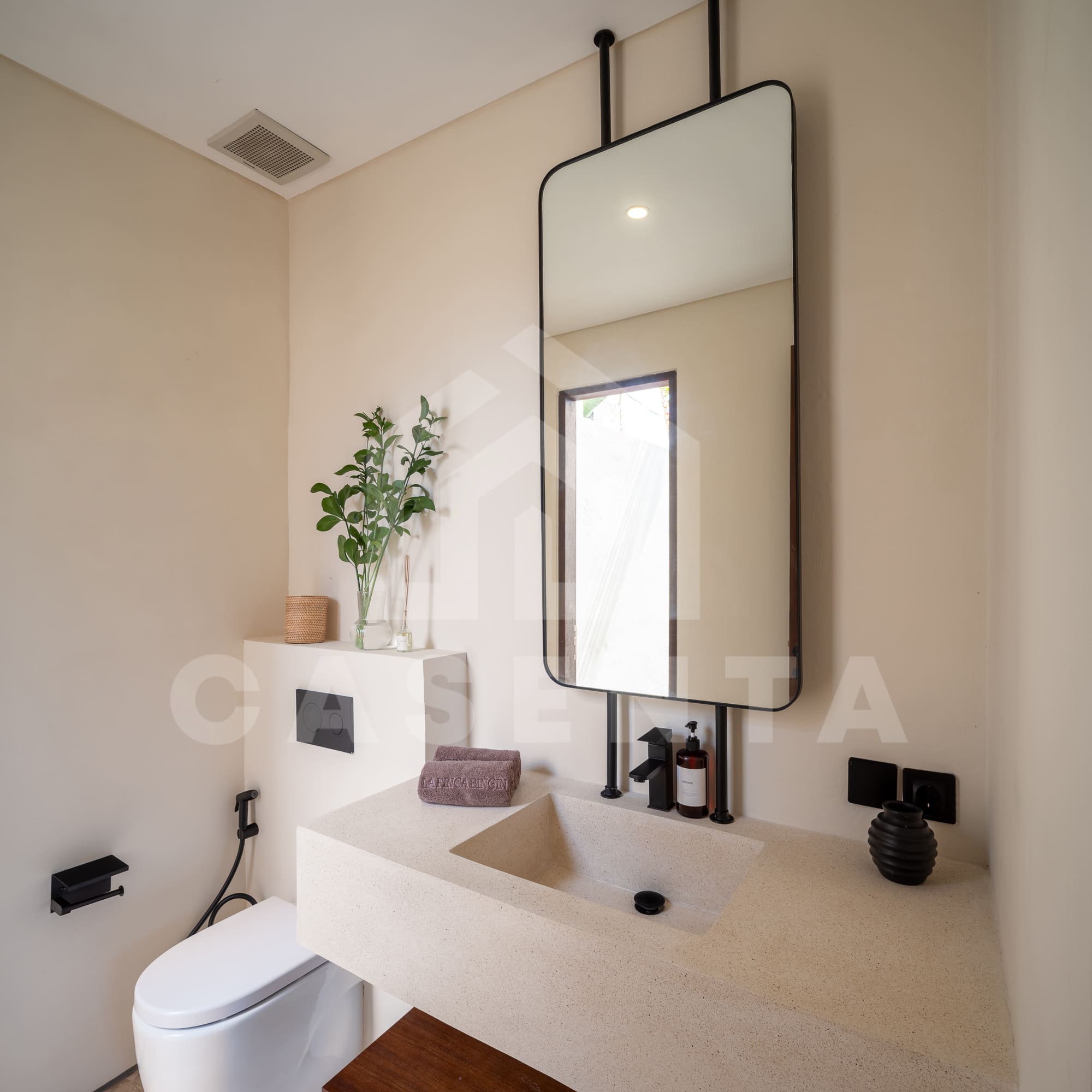 Modern bathroom with floating vanity in Batu Bolong Villa