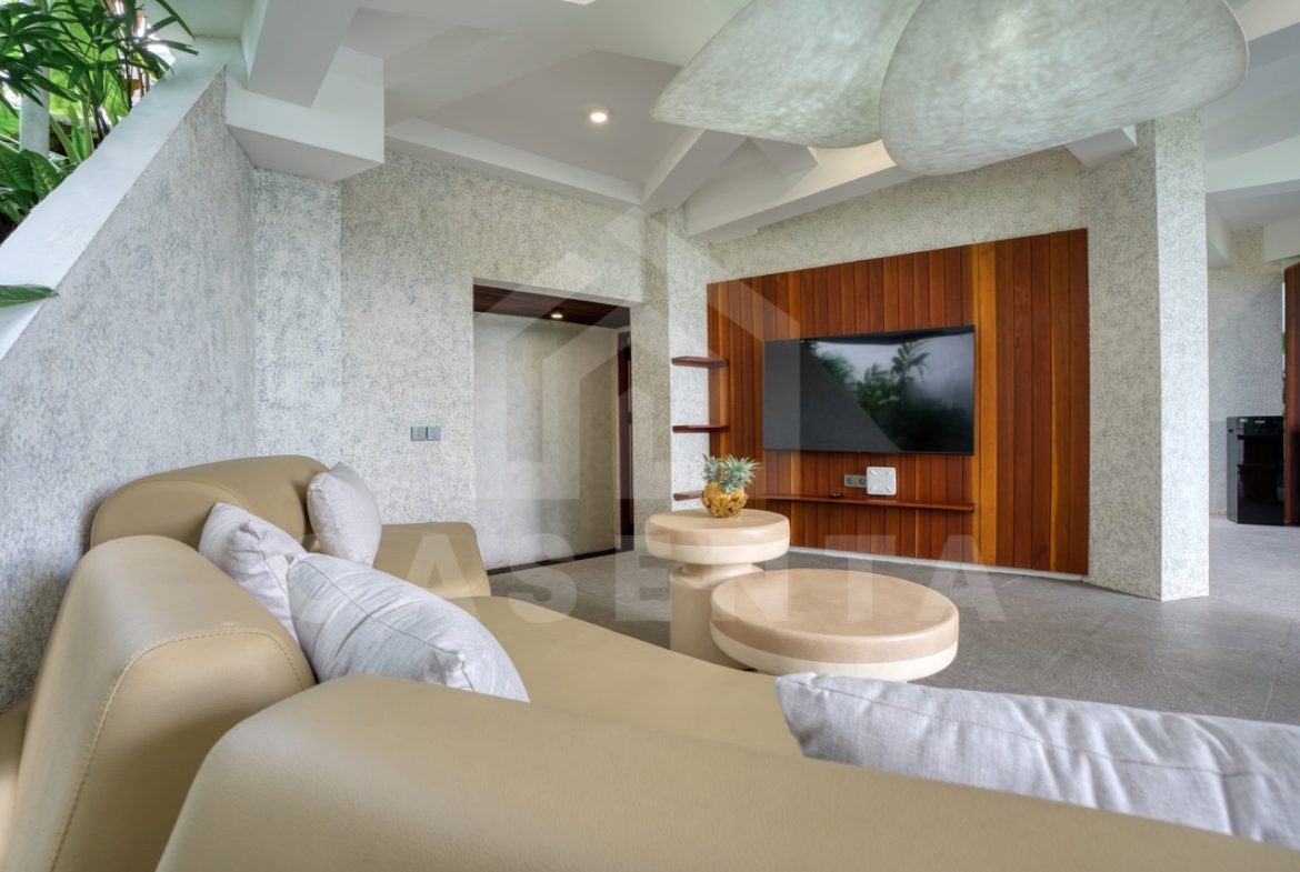 open living area tropical Ubud villa with modern design and lounge seating