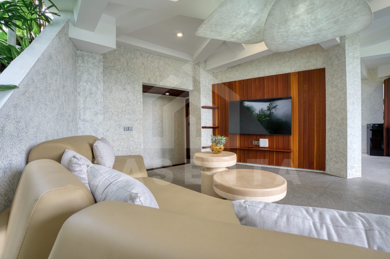 open living area tropical Ubud villa with modern design and lounge seating