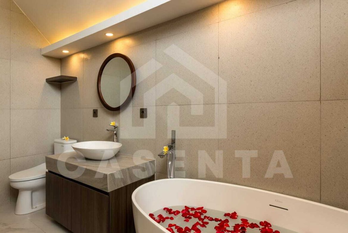 Modern villa bathroom with freestanding bathtub in saba beach villa Gianyar