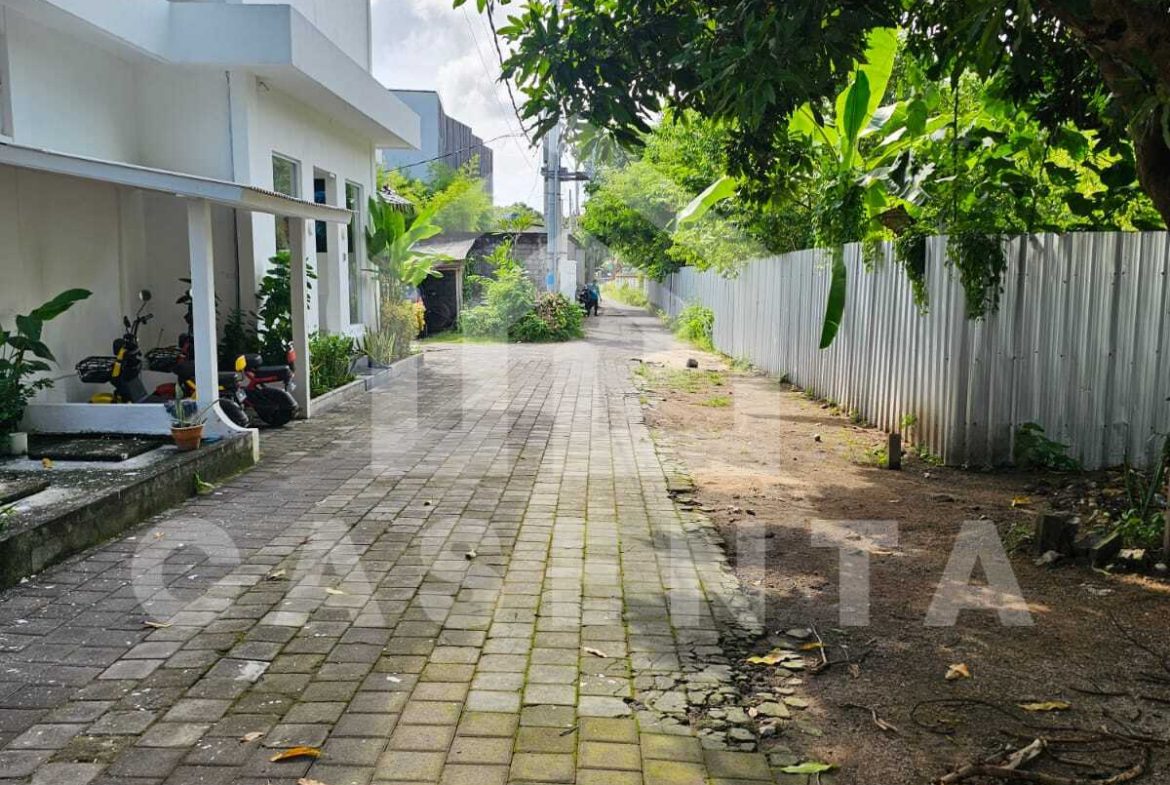 Sanur land for sale with paved access road and surrounding residential villas