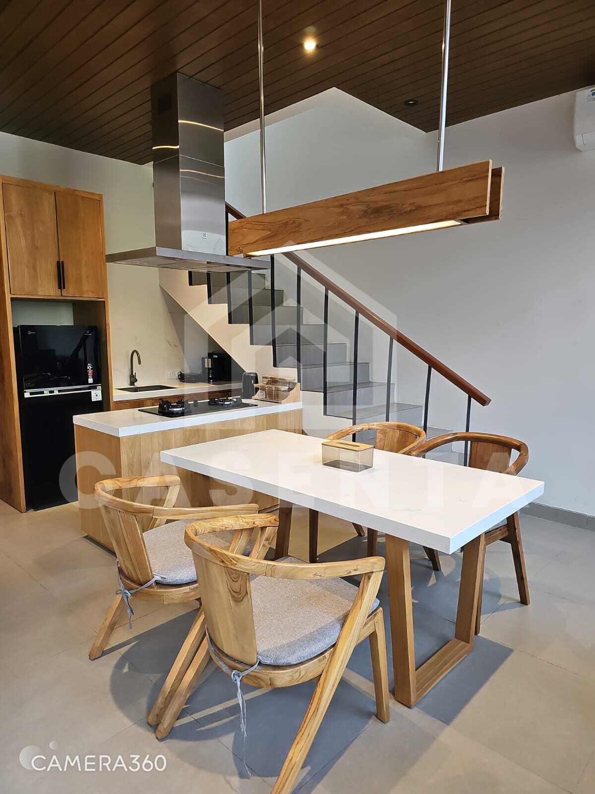 Modern kitchen and dining area inside Canggu villa