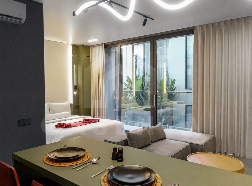 Compact dining setup in Canggu apartment with modern furniture