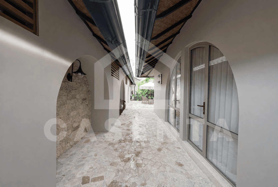 Covered corridor access within Sanur villa complex