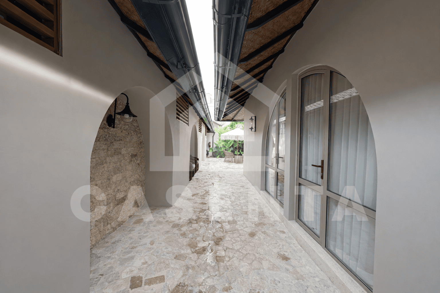 Covered corridor access within Sanur villa complex