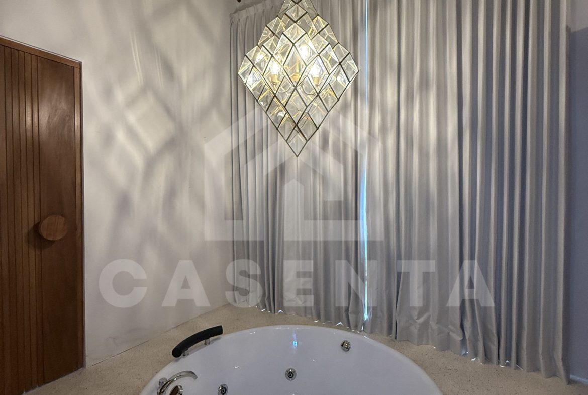 Indoor jacuzzi feature in stylish sanur villa