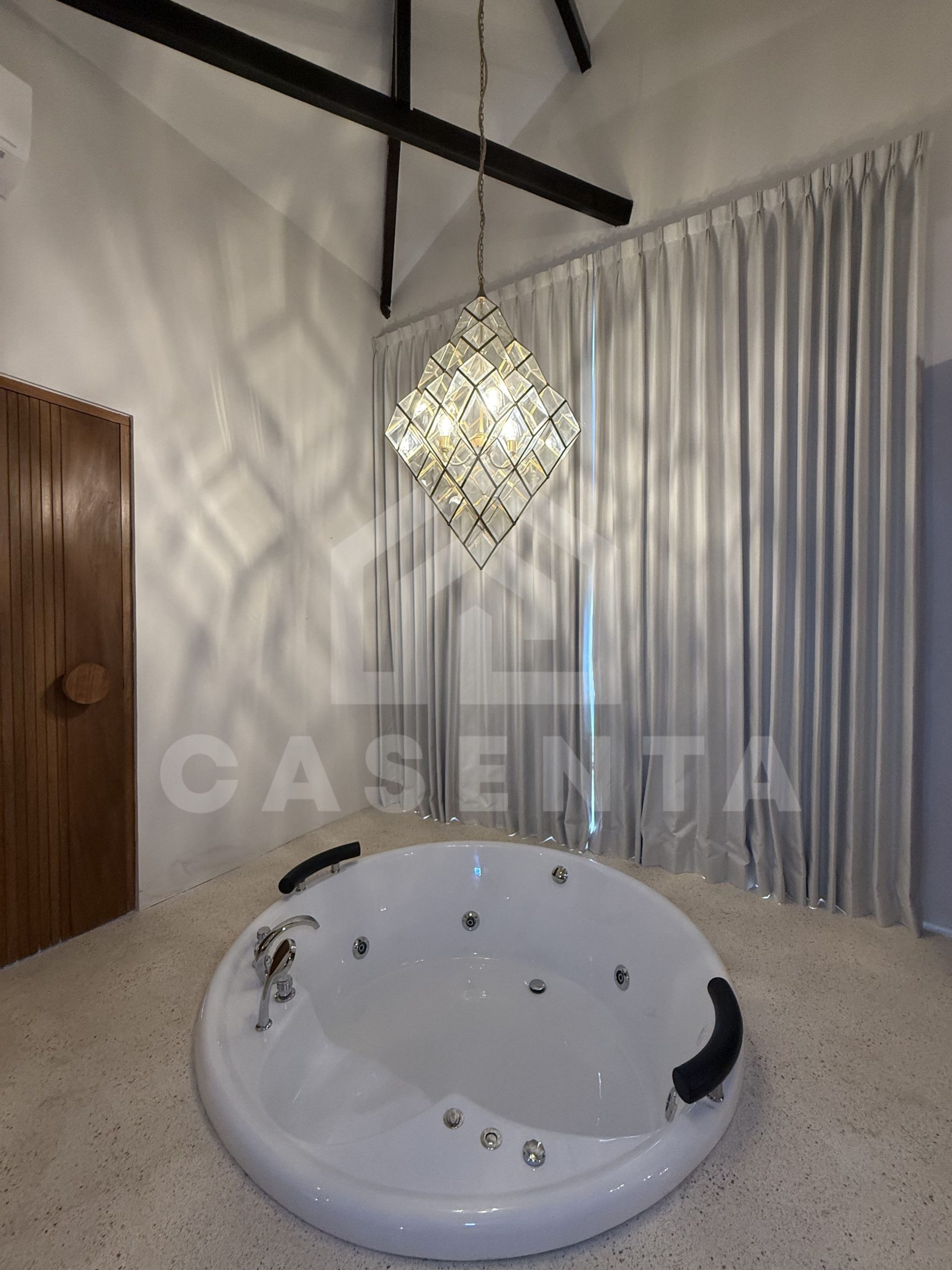 Indoor jacuzzi feature in stylish sanur villa