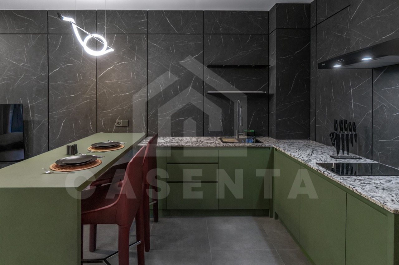 Fully equipped kitchen in Canggu apartment with modern finishes