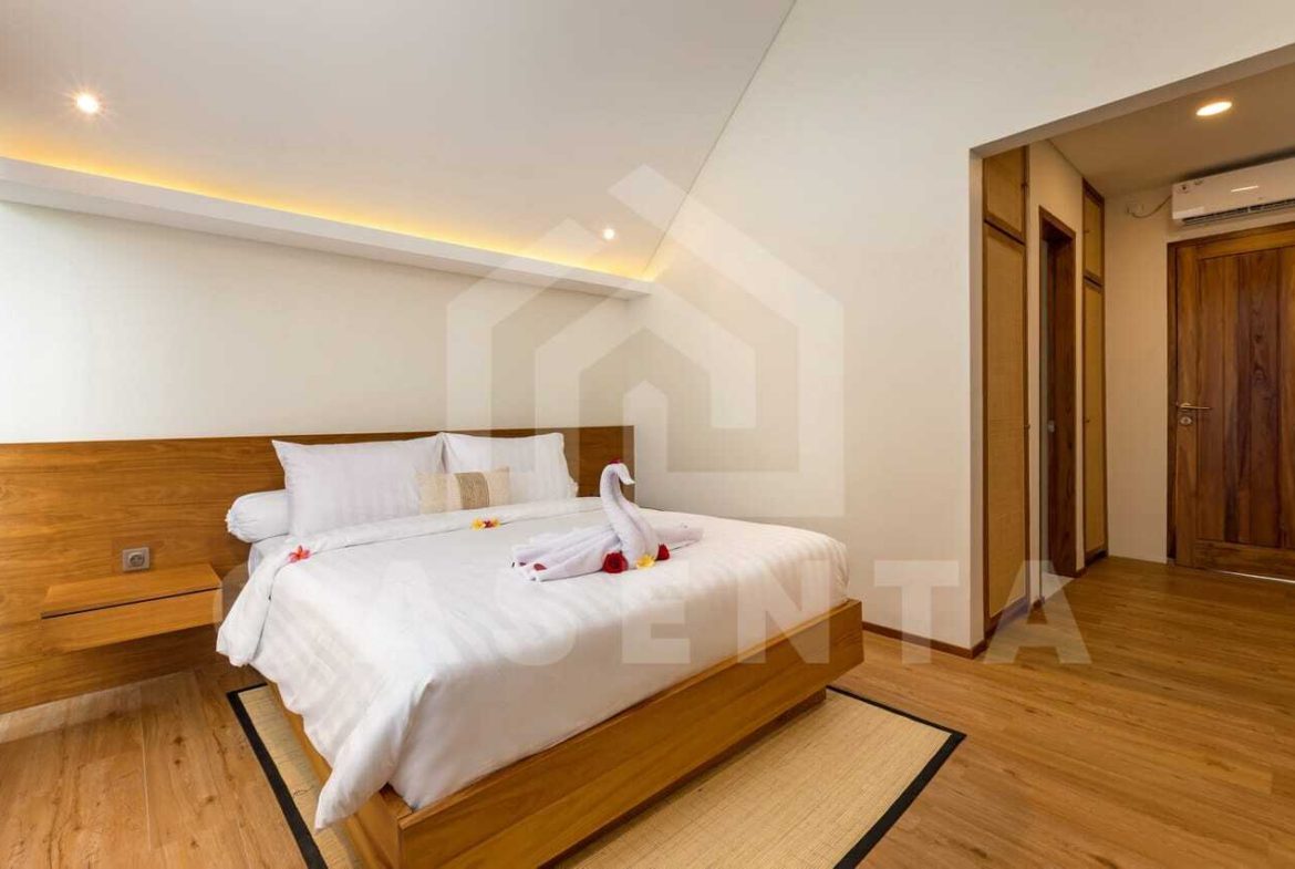 Spacious minimalist bedroom inside saba beach villa