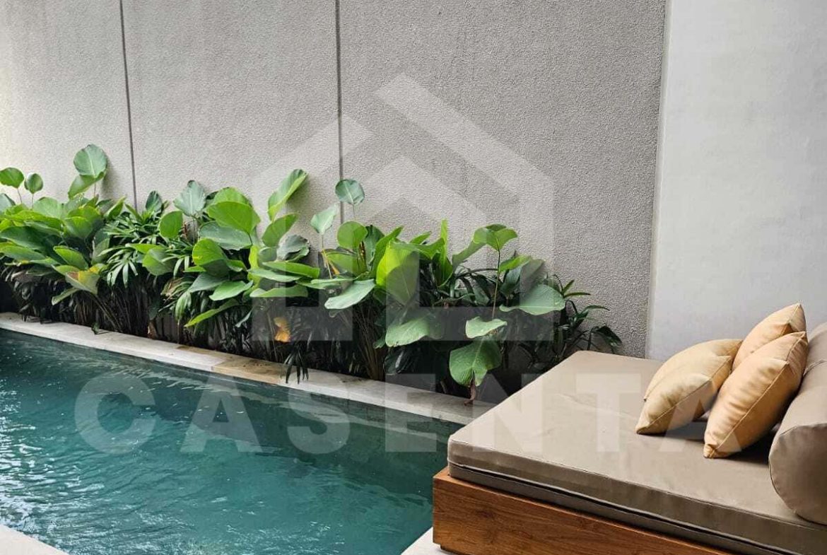 Private pool with lounge area at cemagi villa