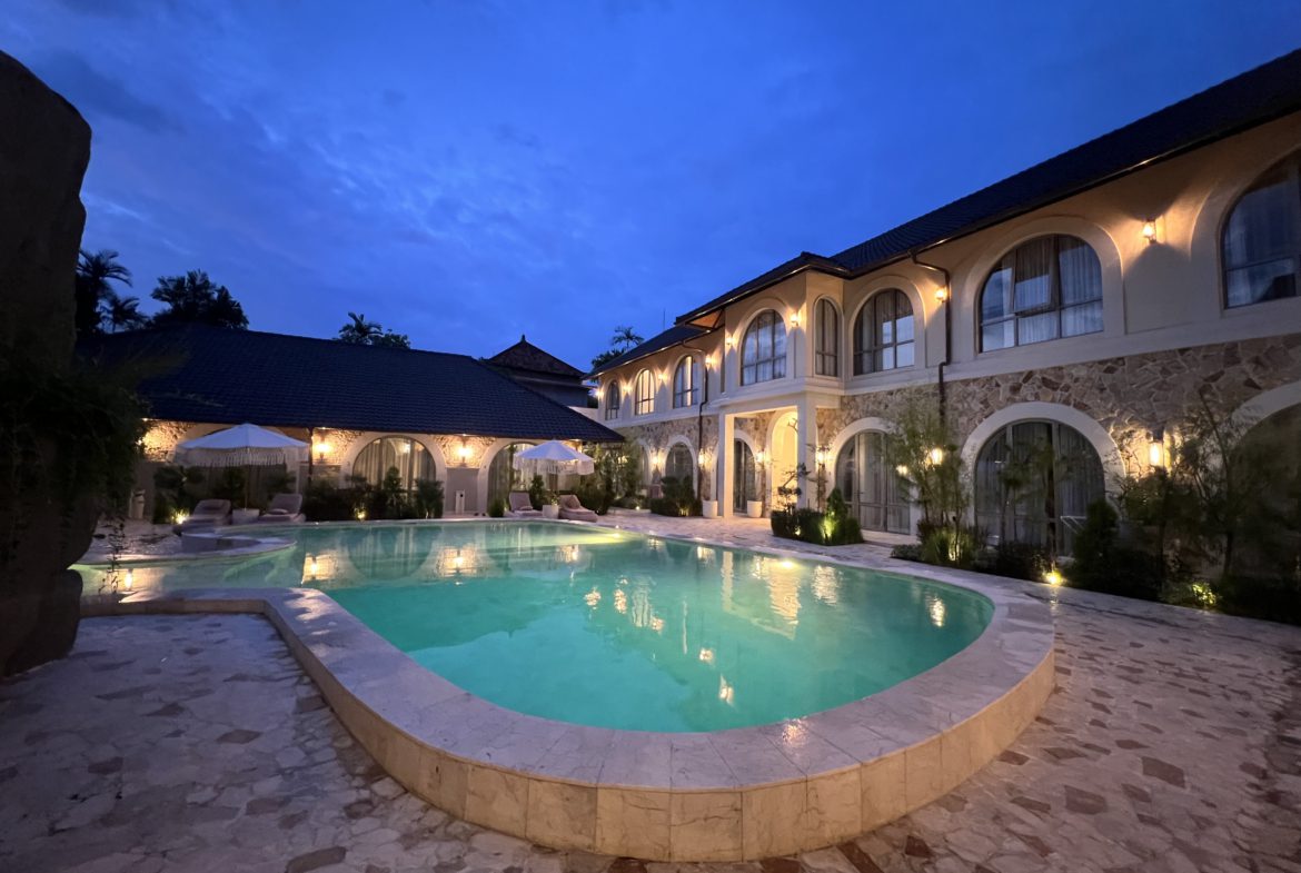 Shared swimming pool at Sanur villa complex near beach