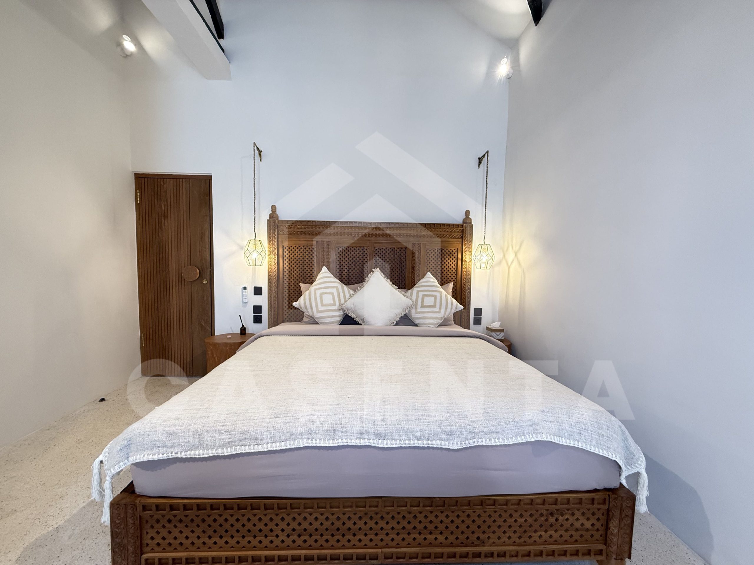 Spacious master bedroom in modern Sanur Bali villa