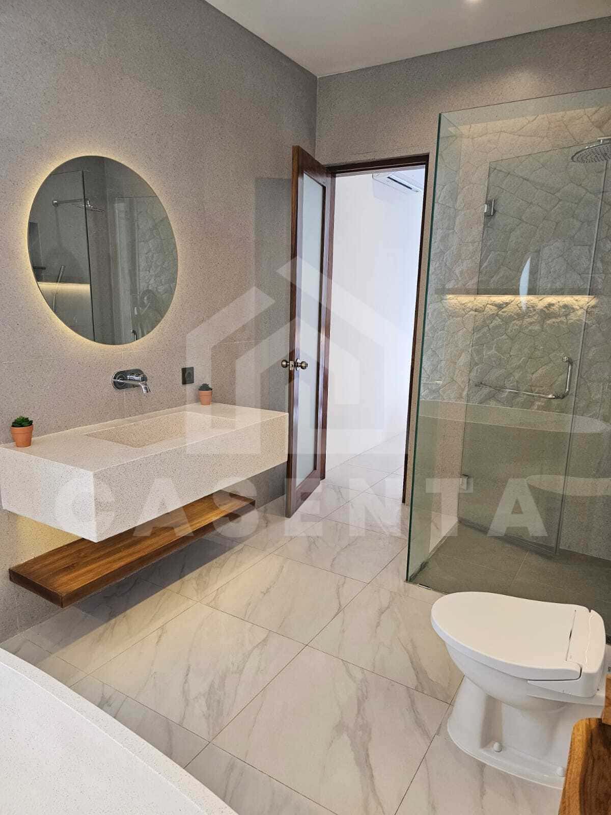 Modern bathroom with rain shower in cemagi villa