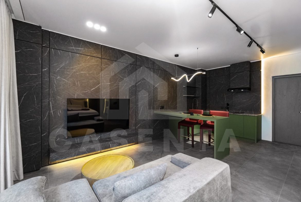 Modern living area in Canggu apartment with TV and lounge space