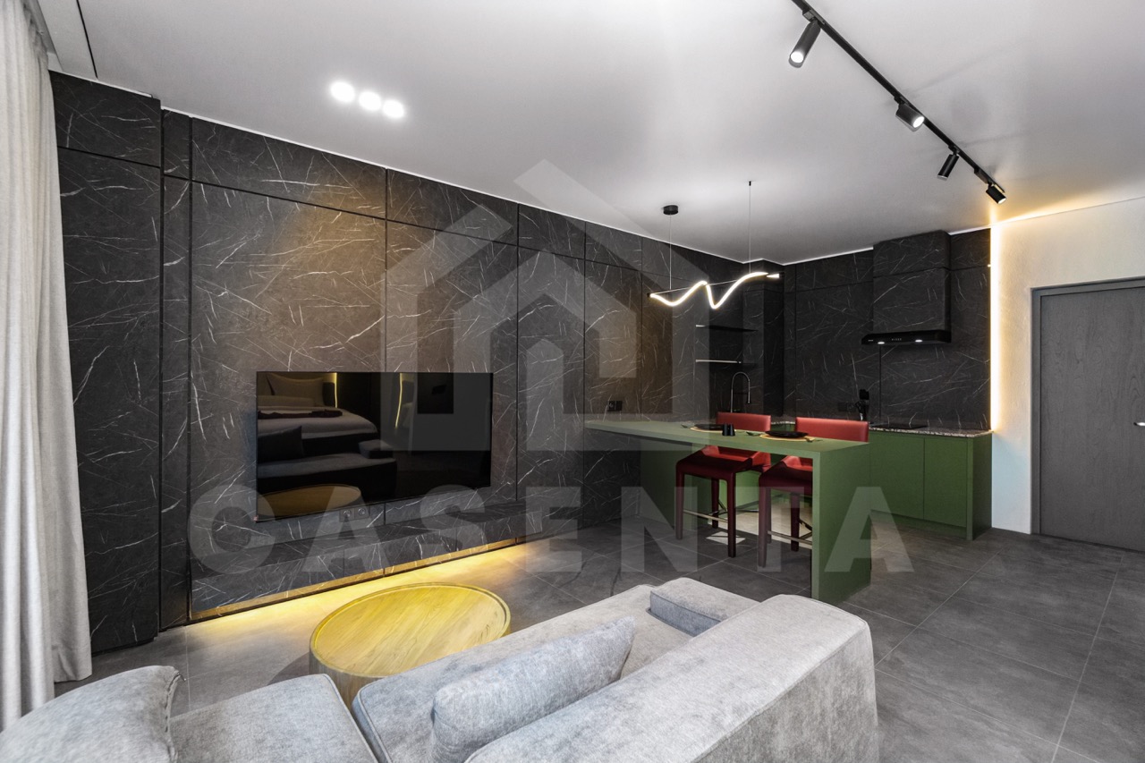 Modern living area in Canggu apartment with TV and lounge space