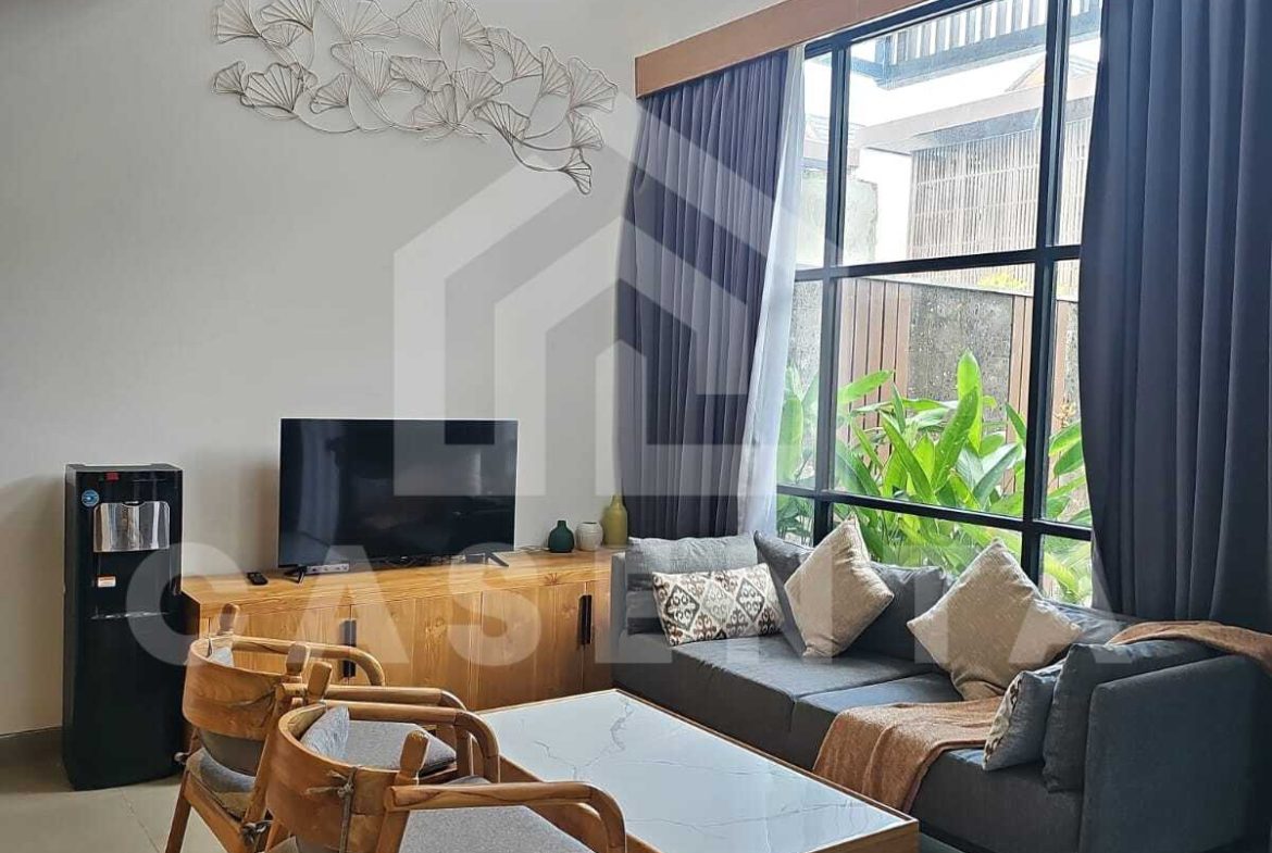 Bright enclosed living room in modern Canggu villa