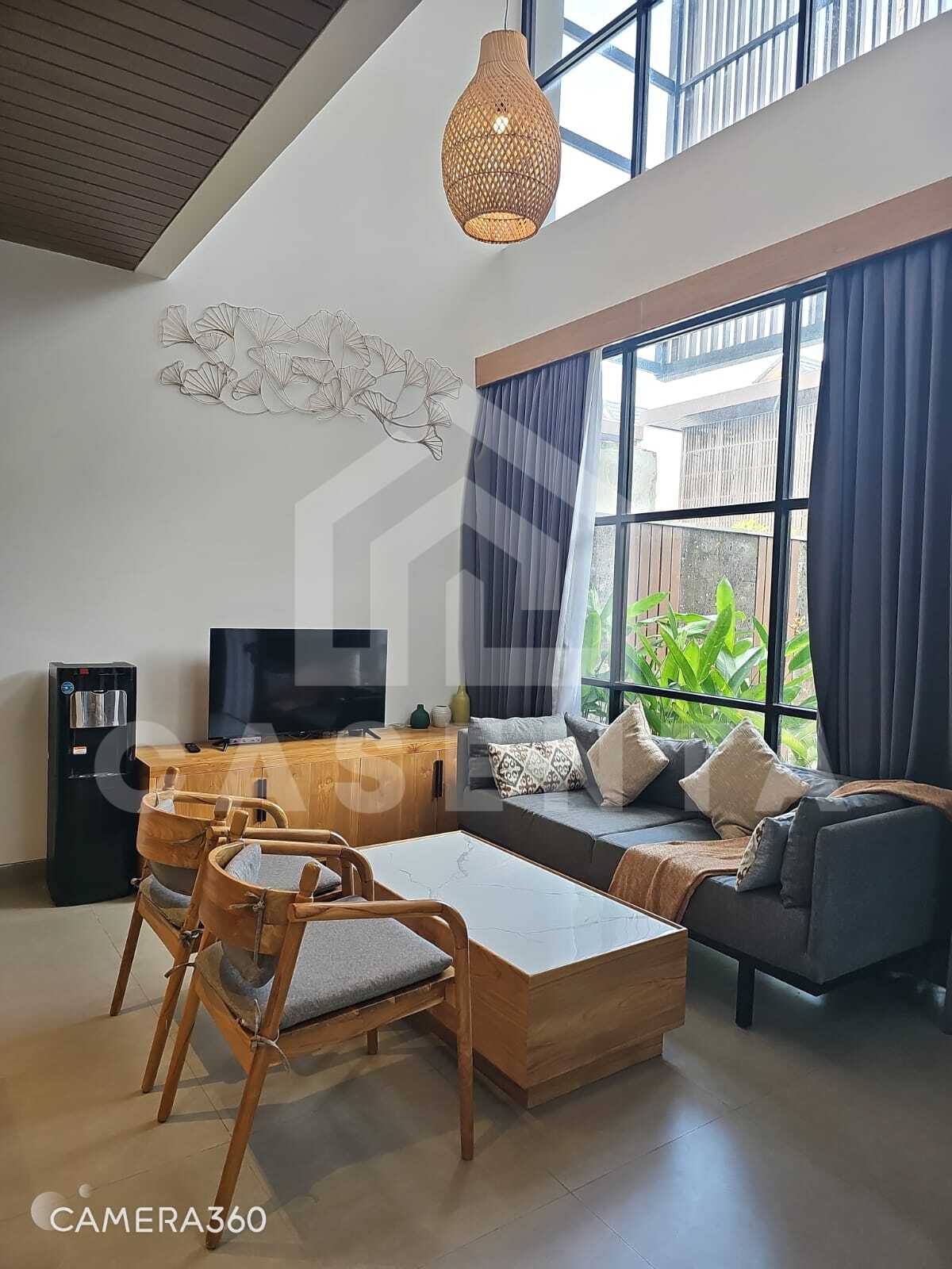 Bright enclosed living room in modern Canggu villa