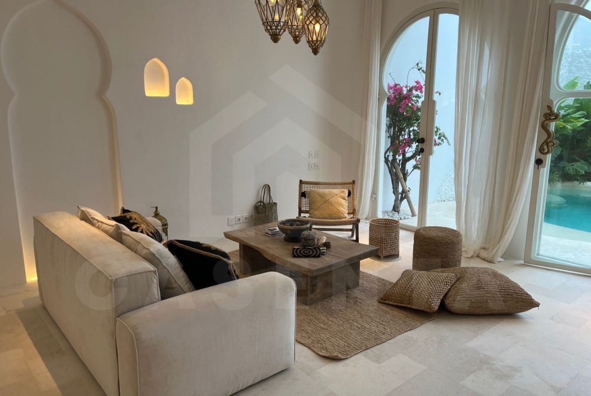 Cozy living room with pool view in aesthetic seseh villa