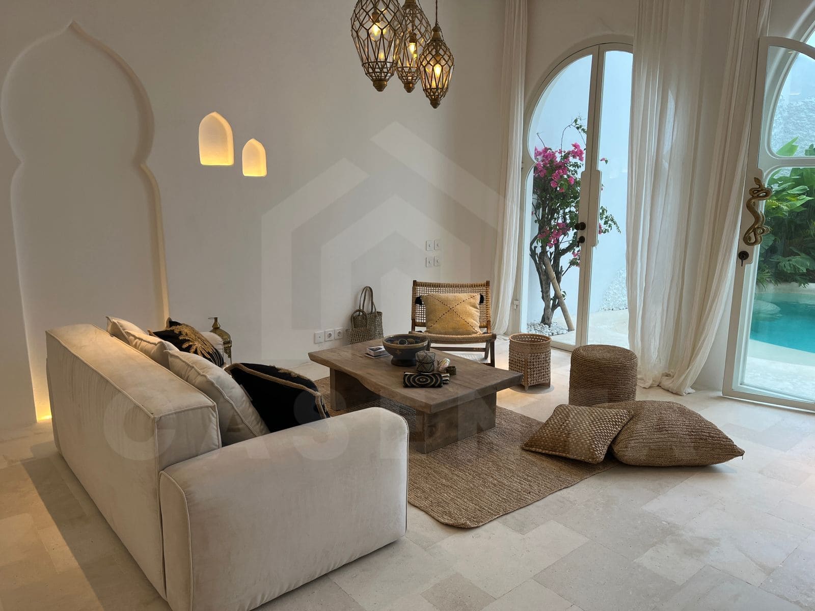 Cozy living room with pool view in aesthetic seseh villa