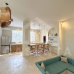 Open-plan living and dining area in sanur villa