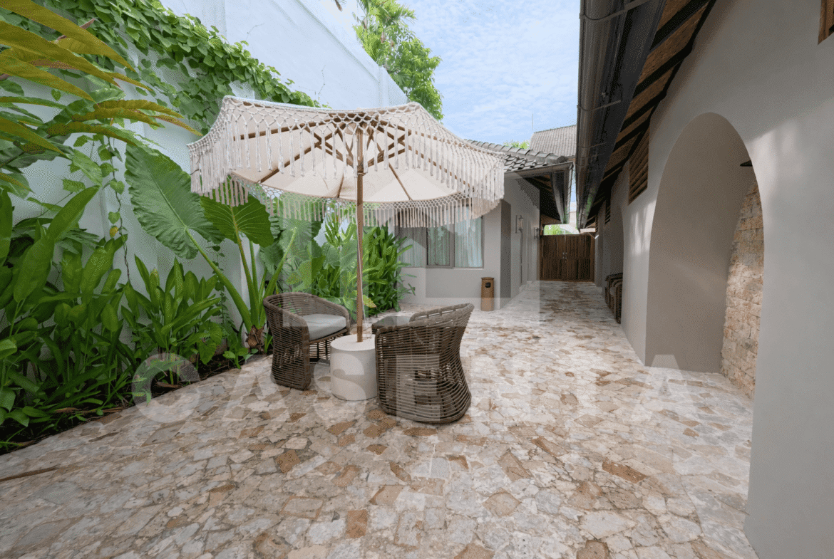 Outdoor sitting area beside Sanur villa unit