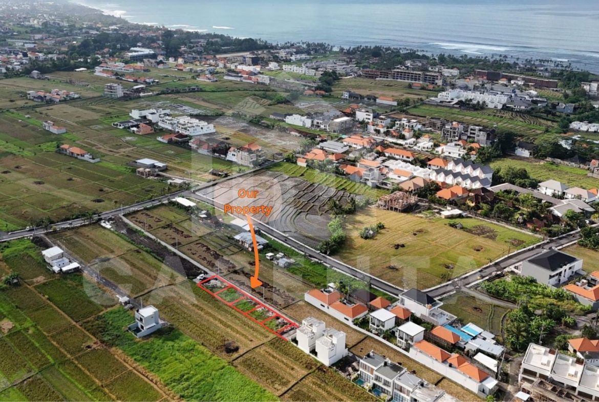 subdivided Cemagi land plots near the beach with surrounding villas and rice fields