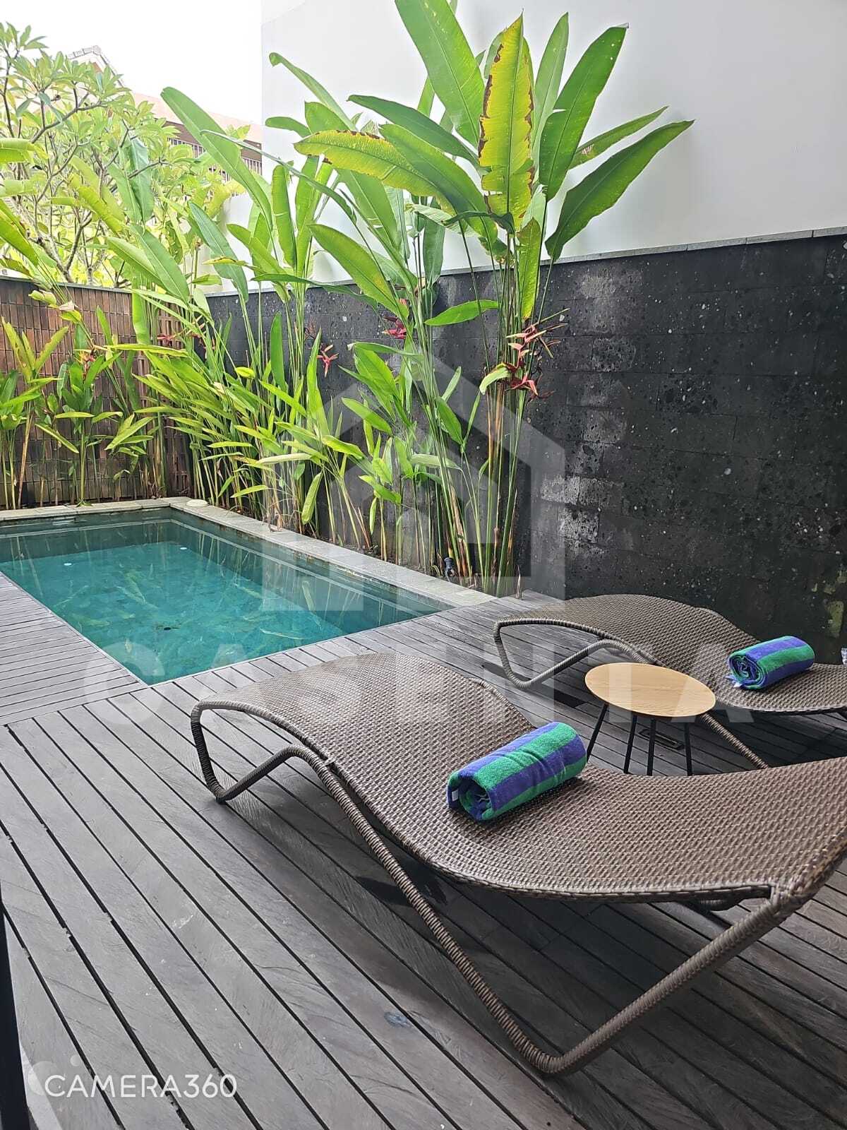 Private swimming pool and deck area in Canggu villa