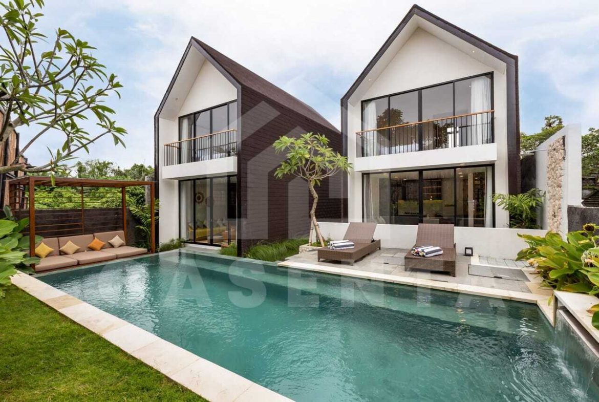 Shared swimming pool and cabana at modern saba beach villa complex