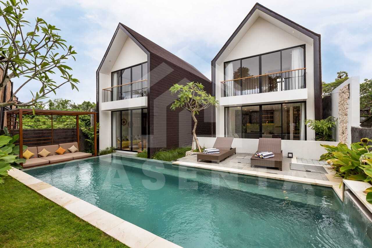 Shared swimming pool and cabana at modern saba beach villa complex