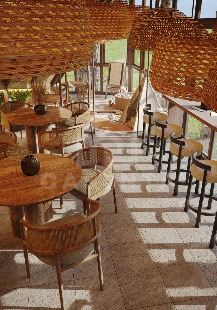 indoor restaurant and lounge area in Ubud villa complex with natural design