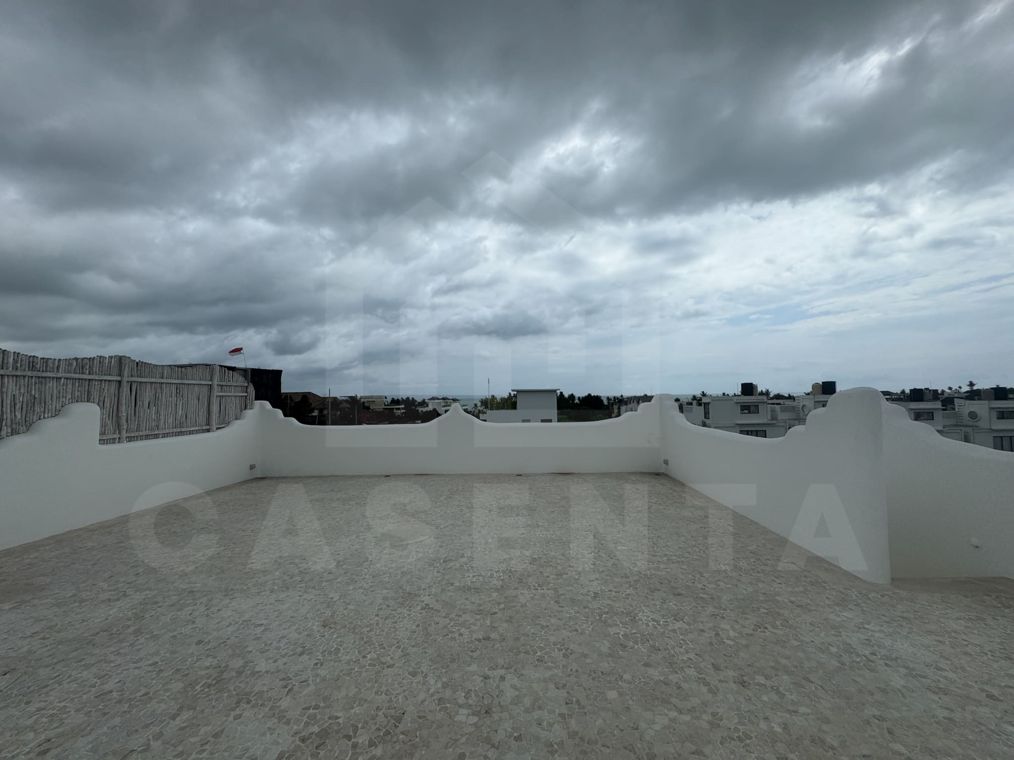 Rooftop terrace with rice field and ocean views at seseh villa