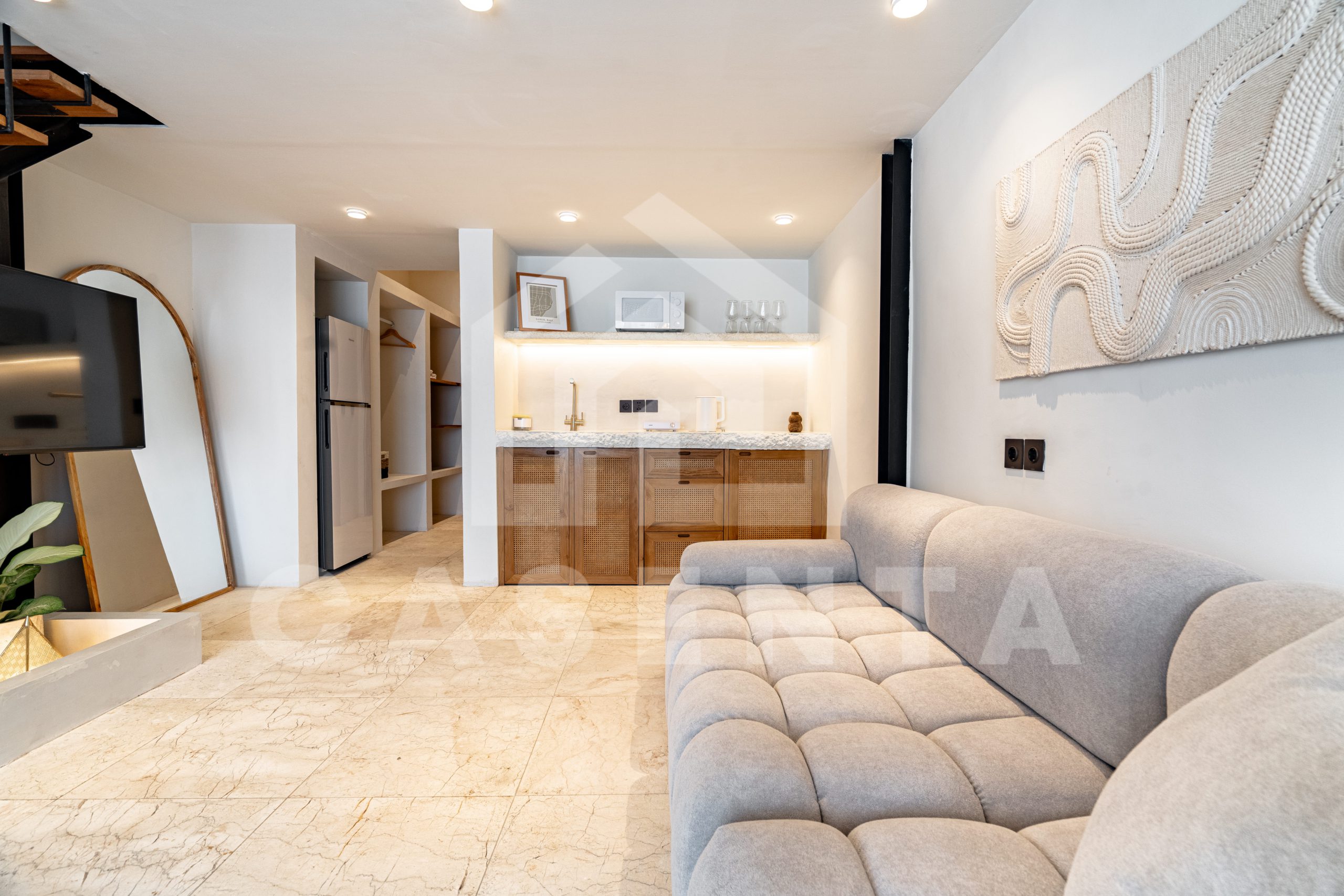 Fully equipped kitchen and lounge in Sanur apartment