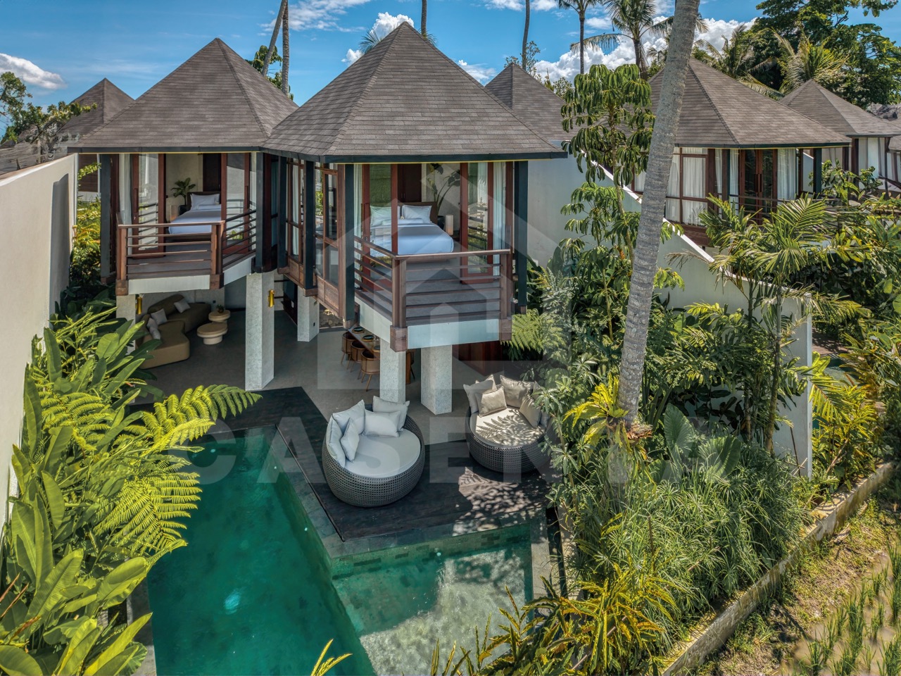 tropical Ubud villa exterior with private pool and lush garden