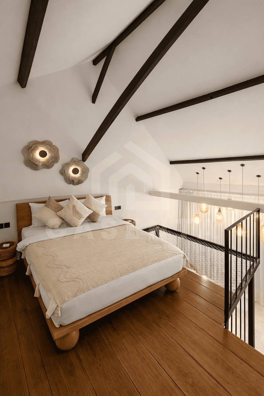 Mezzanine bedroom in Sanur apartment with wood flooring