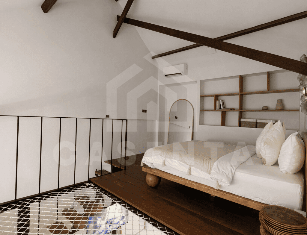 Loft bedroom with mezzanine layout in Sanur apartment