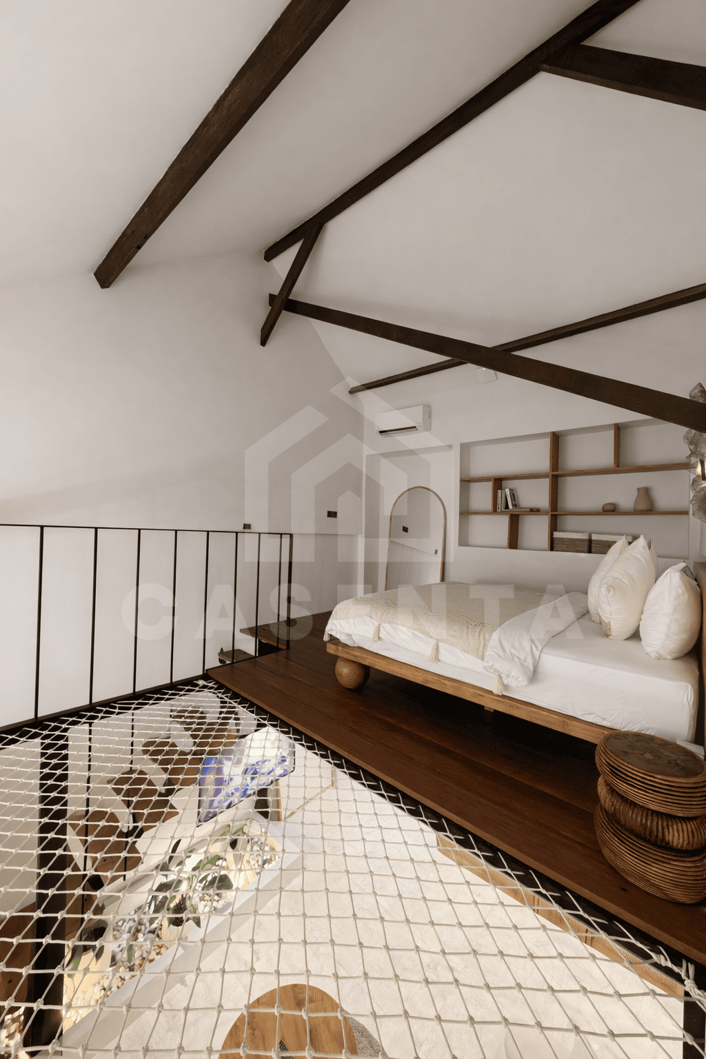 Loft bedroom with mezzanine layout in Sanur apartment