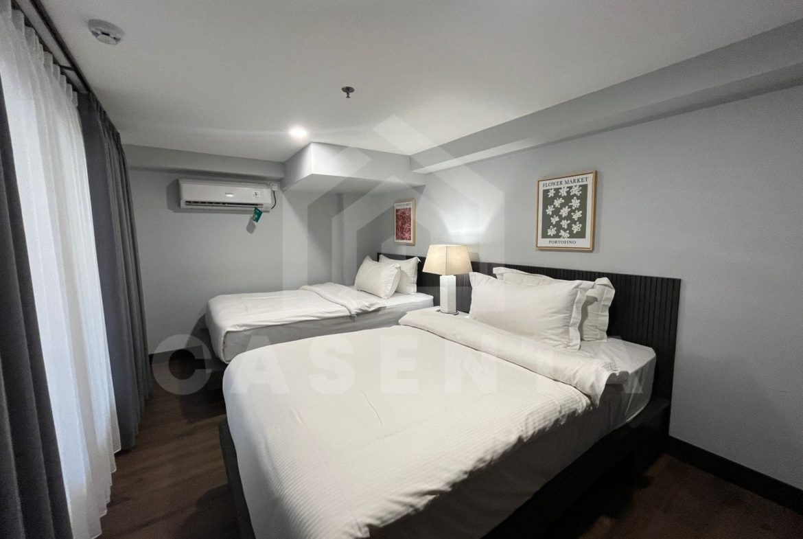 Twin bedroom layout in Canggu apartment for guests
