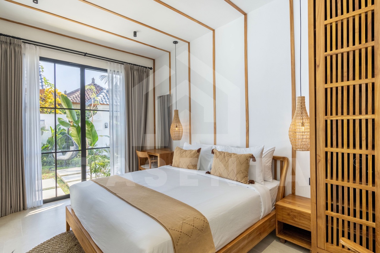 Ensuite bedroom in Sayan villa with modern tropical design
