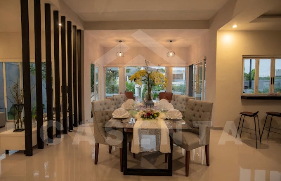 dining area in Ungasan villa with high ceiling and natural light