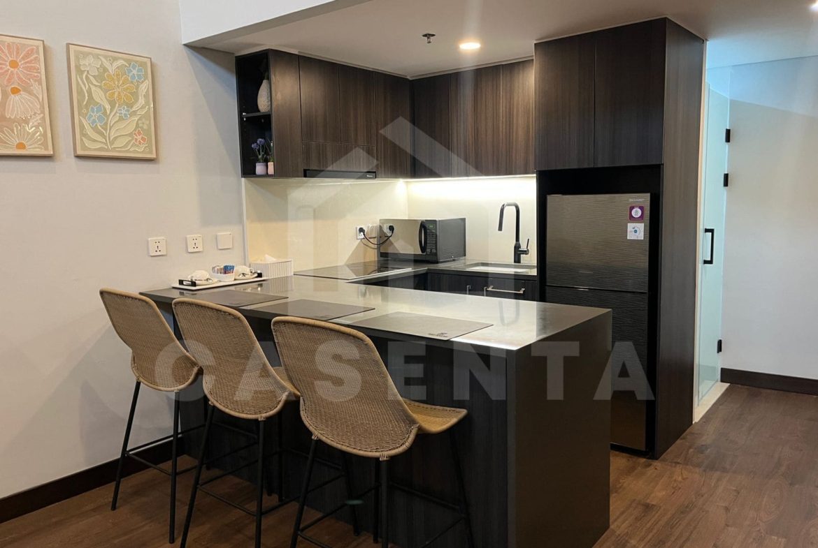 Modern kitchen and dining area in Canggu apartment