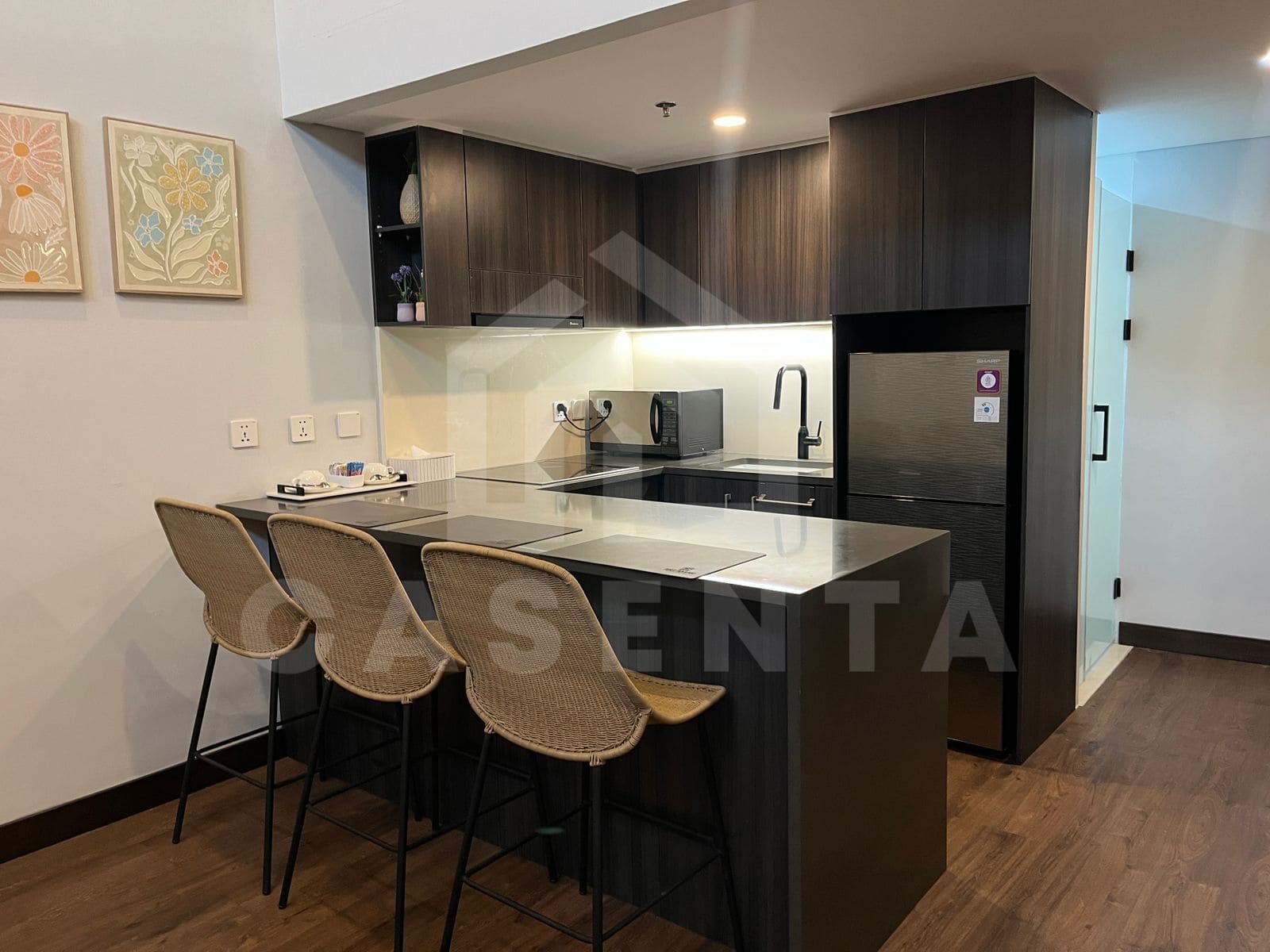 Modern kitchen and dining area in Canggu apartment