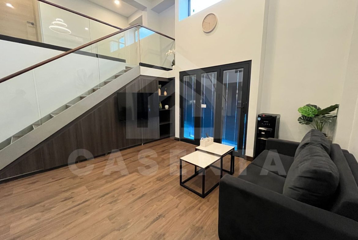 Living area with modern interior in Canggu apartment