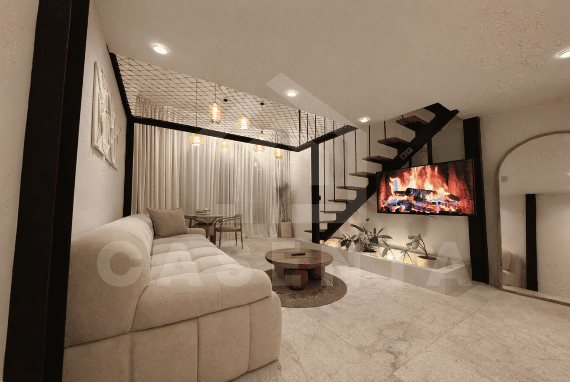 Open living space with mezzanine loft in Sanur apartment