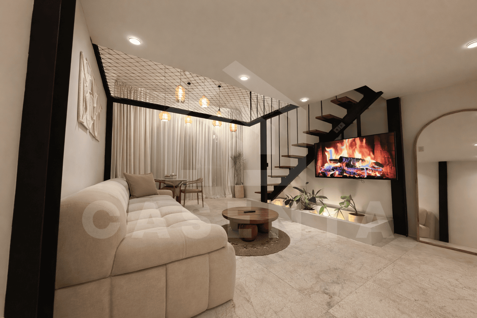 Open living space with mezzanine loft in Sanur apartment