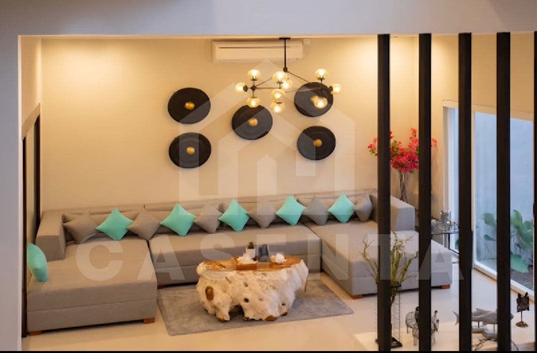 large living area in Ungasan villa with sectional sofa and modern decor
