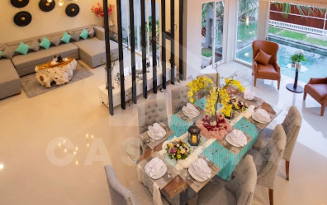 open plan living and dining in Ungasan villa with pool view