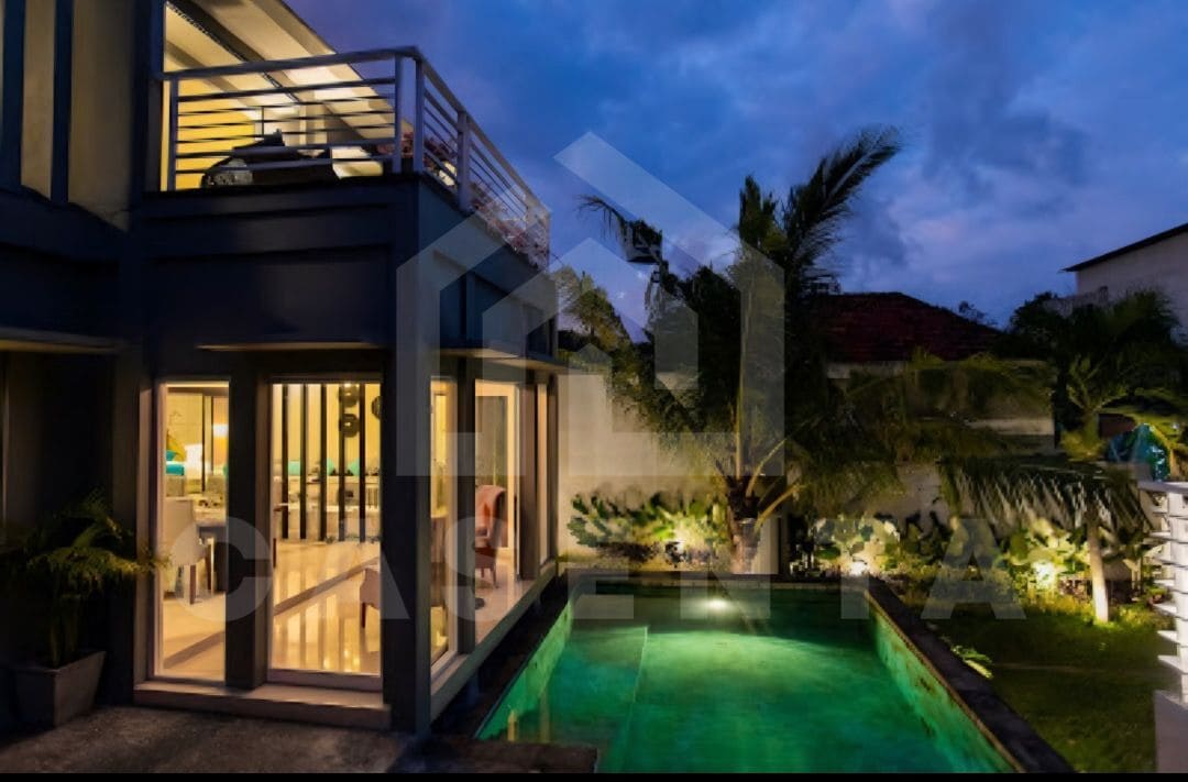 private pool in Ungasan villa with garden and night lighting