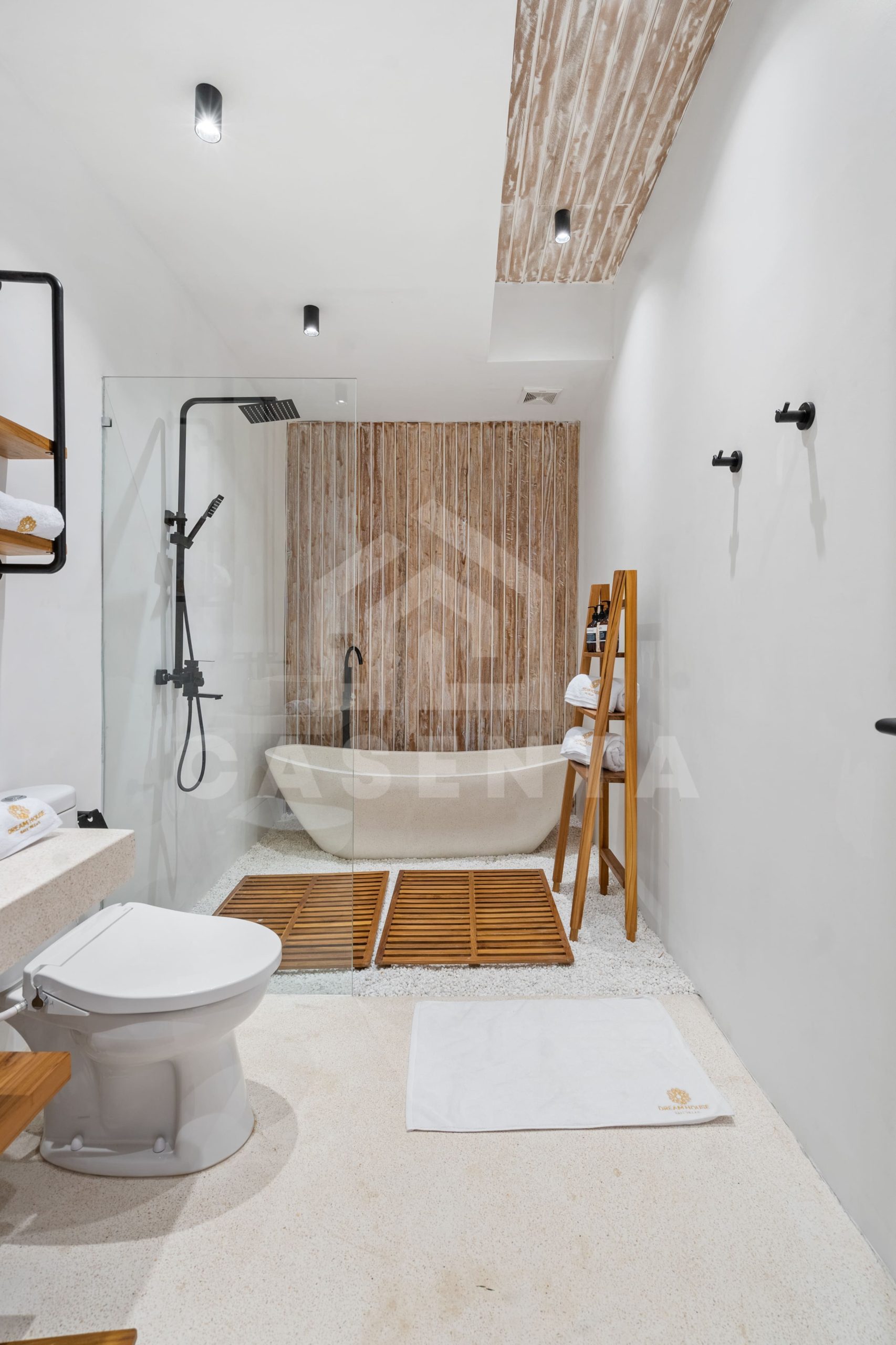 Sayan villa bathroom with freestanding bathtub and tropical design